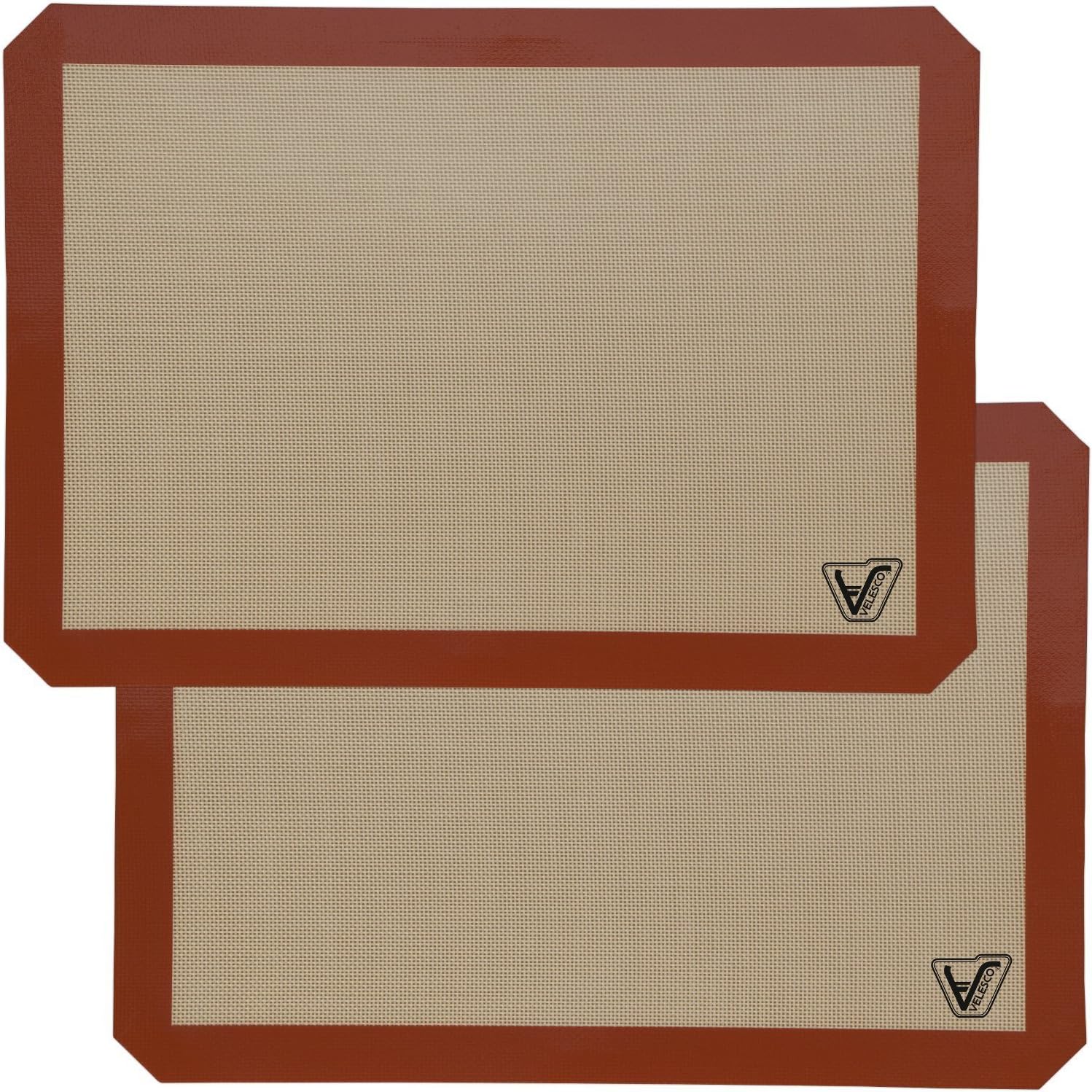 Silicone baking mats on sheet pans with cookies