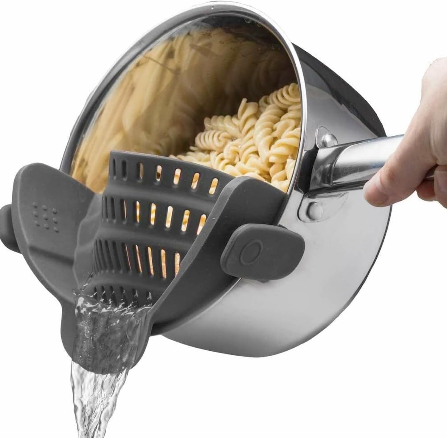 Snap N Strain clip-on strainer attached to a pot draining pasta