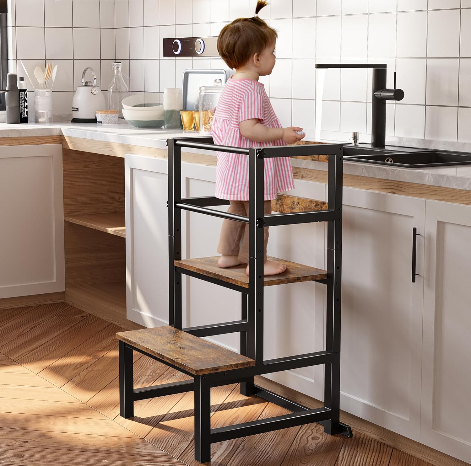Kids two-step stool in kitchen next to counter